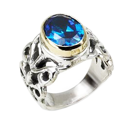 Sterling Silver Ring with Carvings and Blue Topaz Stone