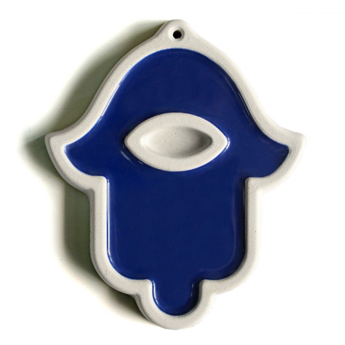 Blue Hamsa Wall Hanging from White Concrete by ceMMent